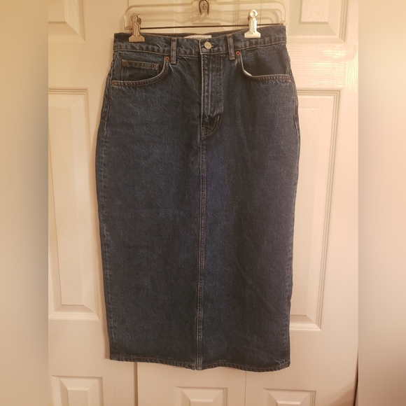 Reformation blue denim long skirt with back split.